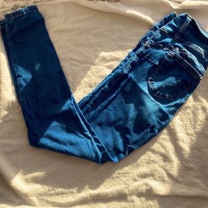 Wax butt skinny jeans